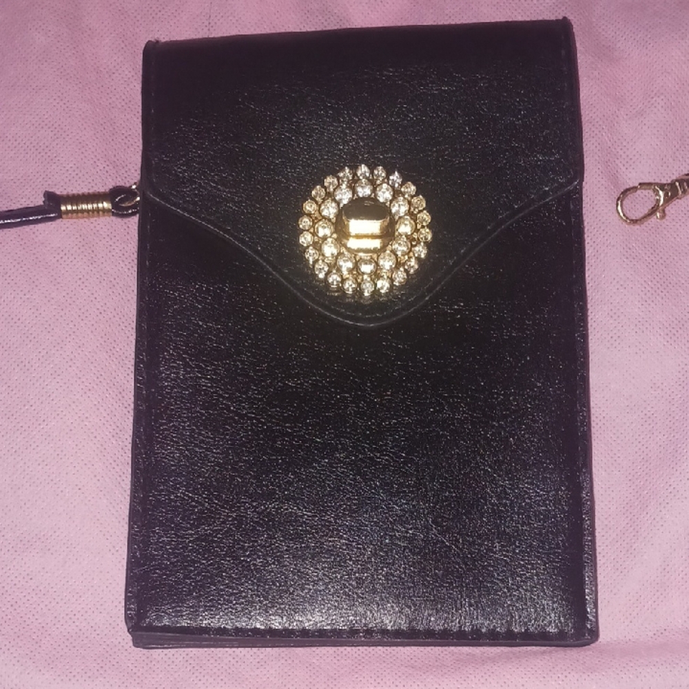Black and Gold Clutch with Ornate Medallion